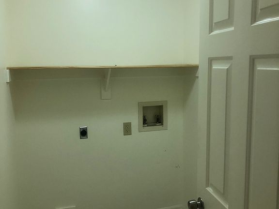 laundry room, new lighting and shelving