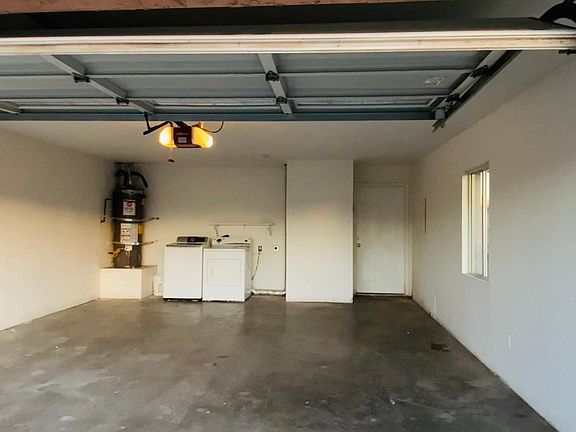 Two car garage with washer and dryer included