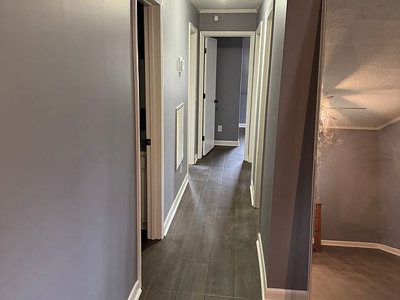 Hall from living room going to all bedrooms and baths.