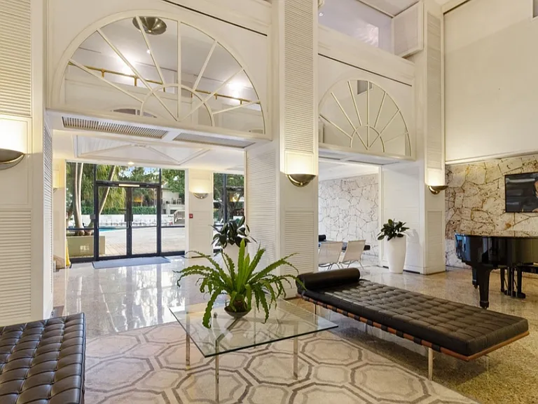 Luxury building's RECEPTION area with 24hr full-service front desk, mailroom & valet (included FREE for tenants)