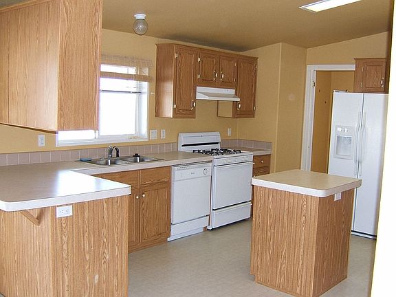 Roomy kitchen w/fridge included!