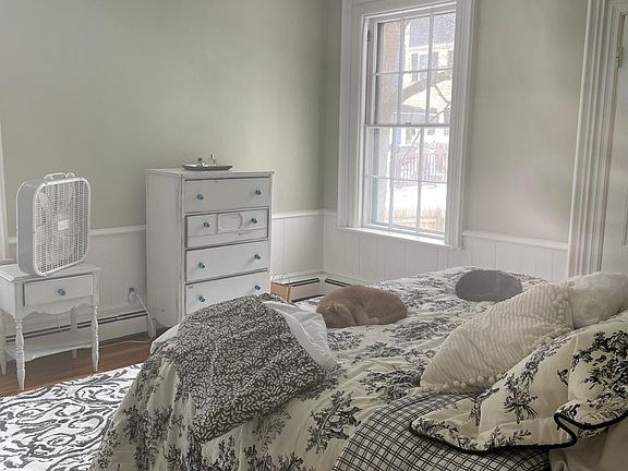 Large light filled master bedroom with walk in closet.