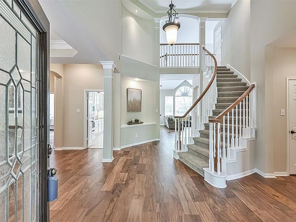 Beautiful Entrance and Stairway showing the beautiful Hardwood flooring