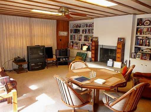 First floor family room with built-in bookcases.