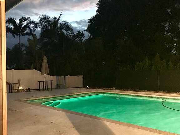 Refinished pool deck, lanai.