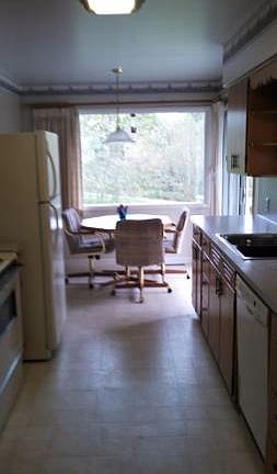 Kitchen and nook that overlooks creek