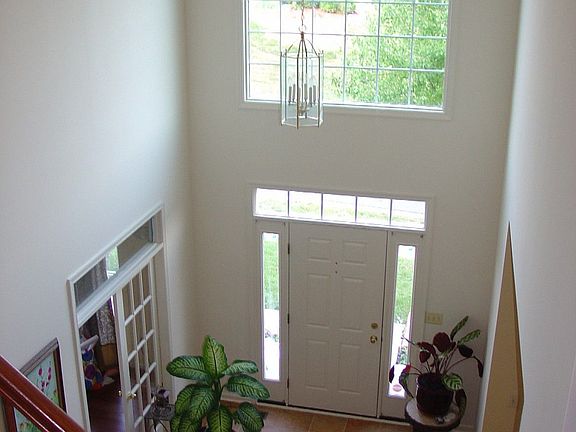 2 story grand foyer w/ transom window