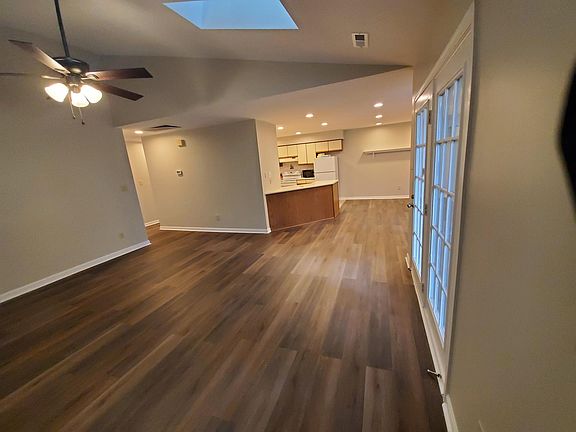View to the dining room and kitchen.