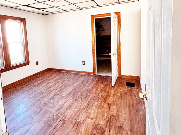 Bedroom #2 with two windows and big walk in closet.