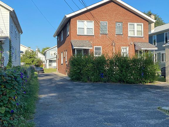 Facing west toward Thomas Road. Driveway parking is shared with 908 Thomas