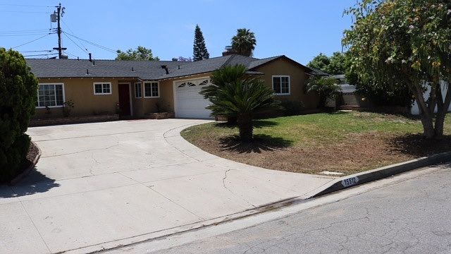 ample parking in driveway and garage