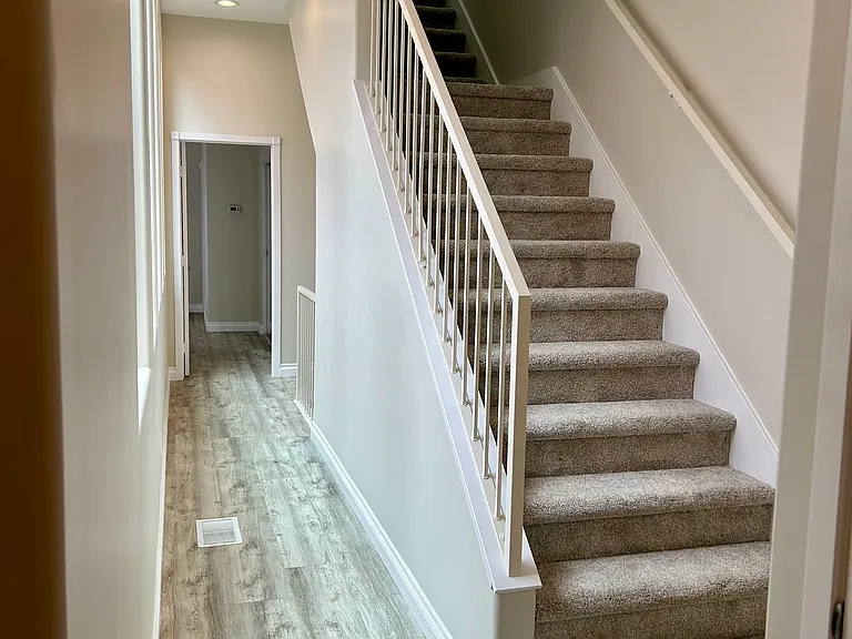 brand new carpet on both sets of stairs in home. this leads to your amazing roof top deck
