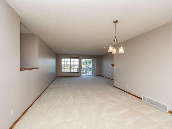 View of formal dining room into living room