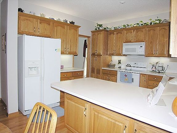 Lots of cabinets in kitchen with under 