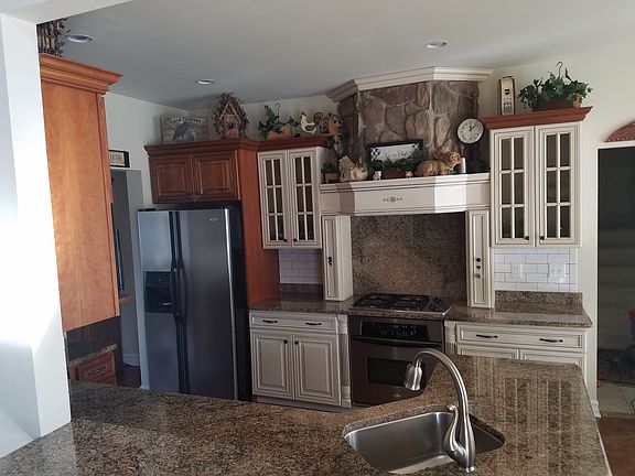Cherry cabinets, granite countertops