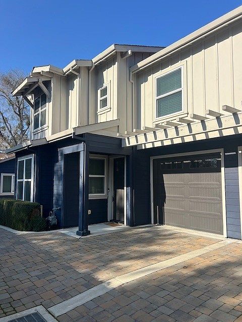 Garage and front door of Unit 1
Shows the 2 story townhouse that it is