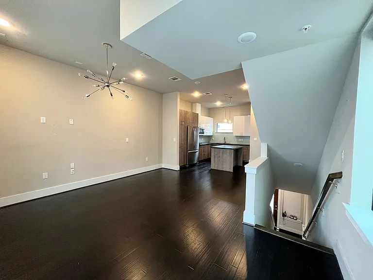 Living space - pre-wired for TV mount set up. In-ceiling surround sound speakers.