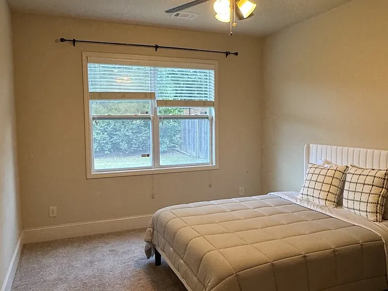 Guest room looking toward to the window