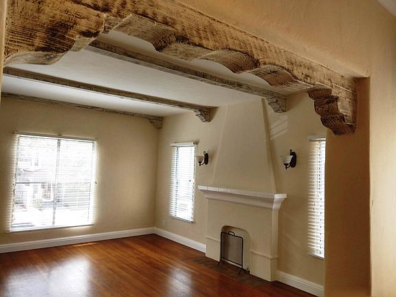 Living room with exposed beams