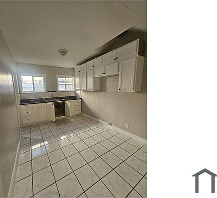 4th image of 5507 1/2 S Normandie Ave