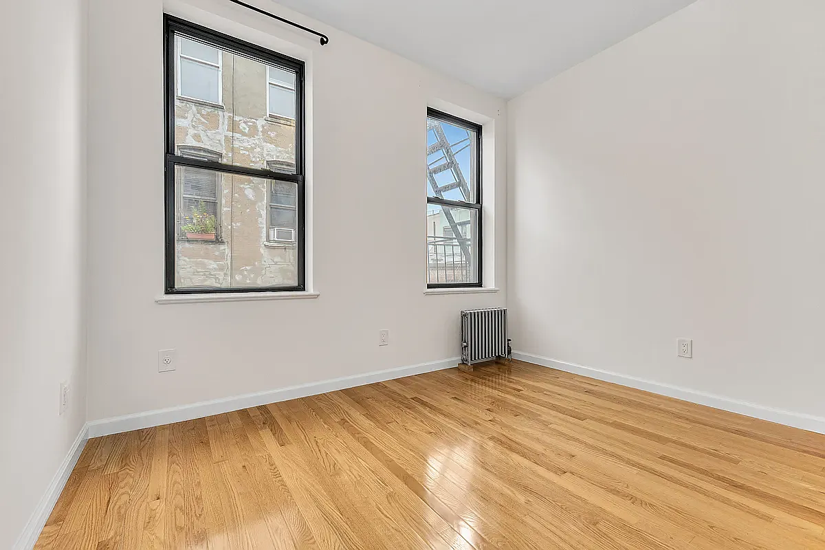 Building Photo - 63 E 7th St #5