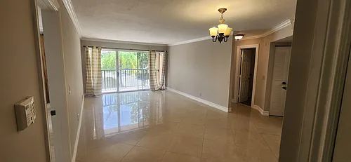 9033 Wiles Rd #204 Photo 1