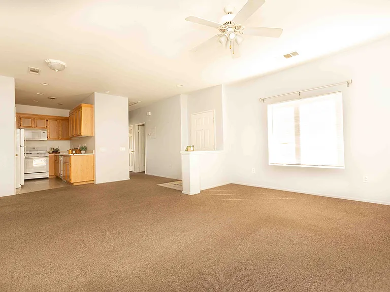 Dining room and open floor plan to the kitchen and living room.