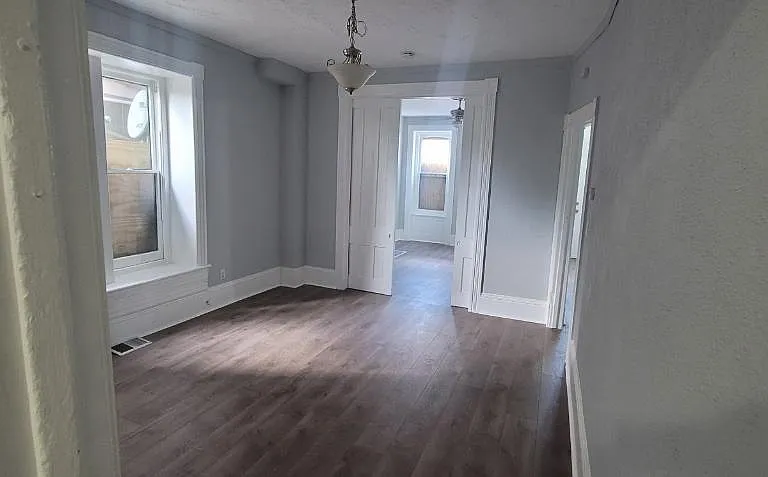 View of the dining room and living room from kitchen