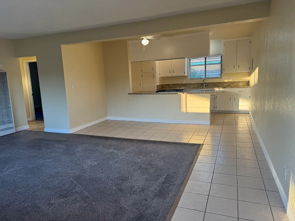 Looking from front door towards kitchen and dining area.