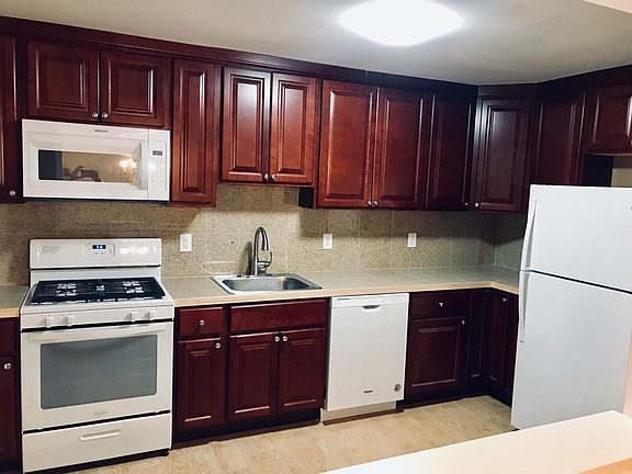 Brand new granite kitchen ,tile floors,new appliances .