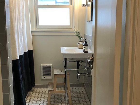 Updated downstairs/main bathroom with full tub/shower.
