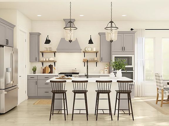 Kitchen with pendant lights and grey cabinets