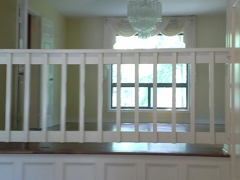 LIVING ROOM WITH CROWN MOLDING THROUGHOUT