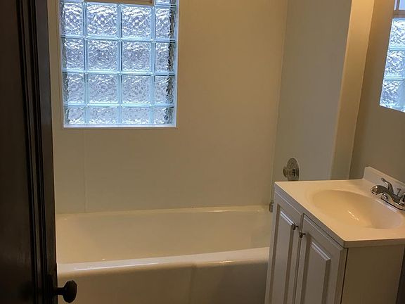 Refreshed bathroom glass block windows