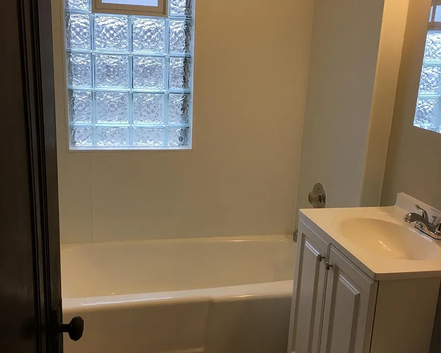 Refreshed bathroom glass block windows