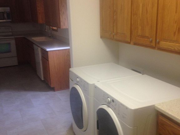 Washer and Dryer with storage cabinets
