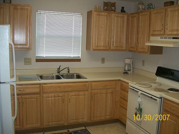 Roomy kitchen, modern oak cabinets