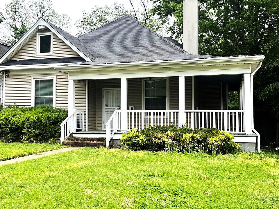 Front of Beautiful home, including wrap porch for enjoying the nice day.