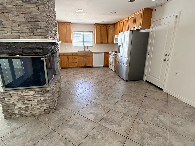 Kitchen,dining area. Door to attached garage