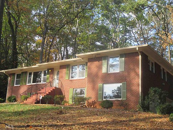 4 Side Brick Raised Ranch on a Full Basement in the Heart of Cascade!