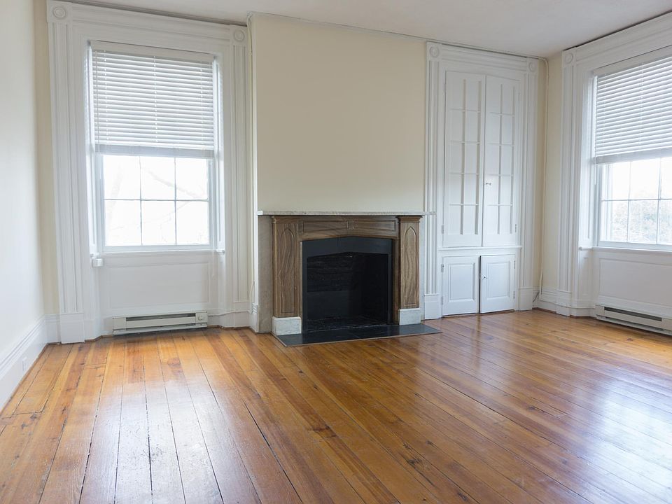 Livingroom with mantel and colonial windows