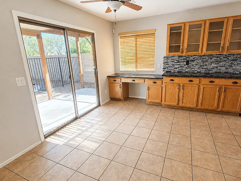 Dining area and slider to back patio.