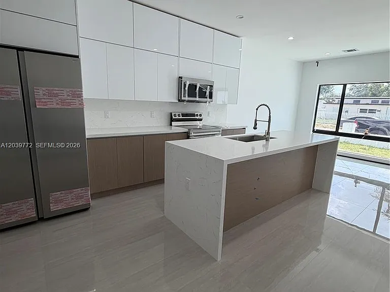 9708 NW 26th Ave — Photo 1