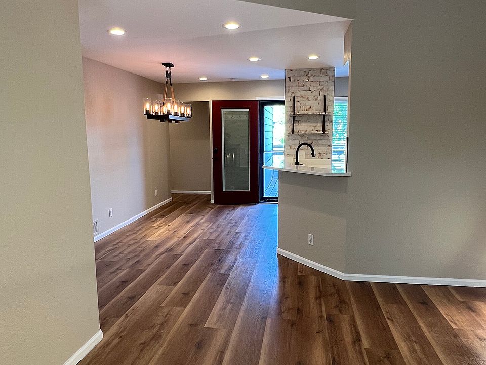 Living area with lofted ceiling
