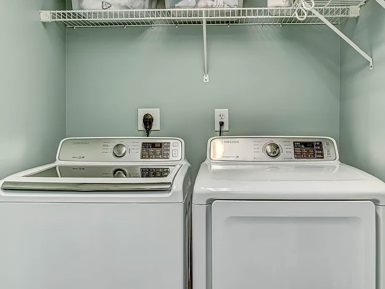 Convenient laundry room in unit.