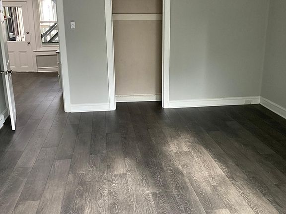 Large living room with great natural light, new flooring throughout