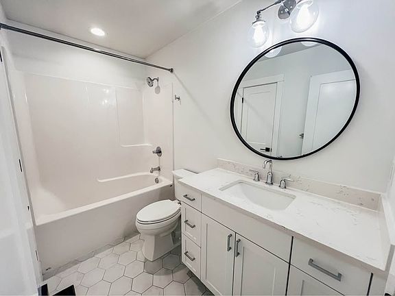 Modern full bathroom with updated fixtures and clean, contemporary design.