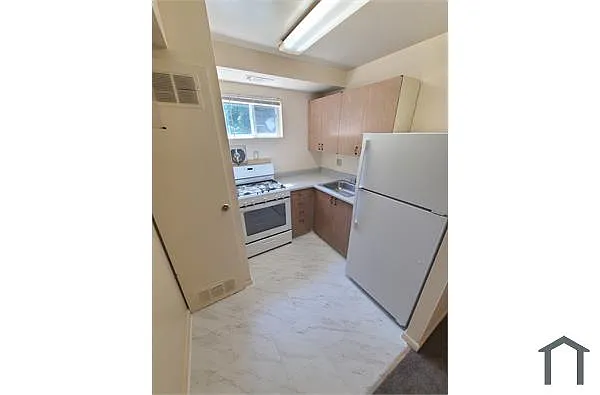 Building Photo - 6114 Fairdel Ave #1H