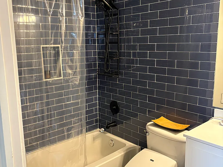 Second floor bathroom, newly remodeled with glass tile