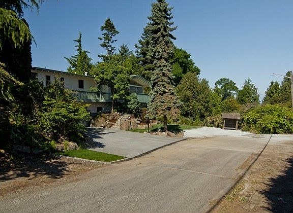 Located on a private cul-de-sac, your only traffic is the neighb